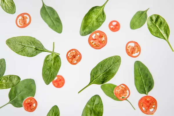 Background Sliced Tomatoes Green Spinach Leaves Isolated Grey — Stock Photo, Image