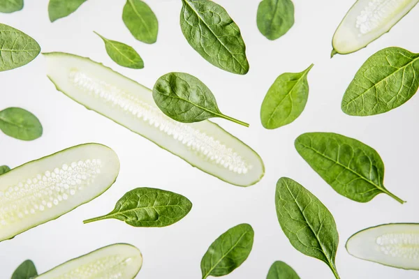 Background Fresh Spinach Leaves Sliced Cucumbers Grey — Stock Photo, Image