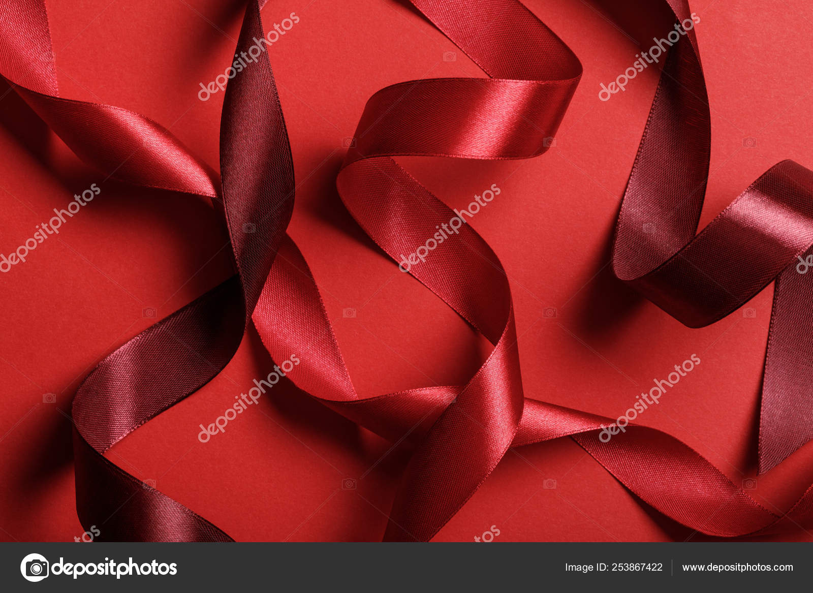Close Silk Burgundy Red Ribbons Red Background Stock Photo by