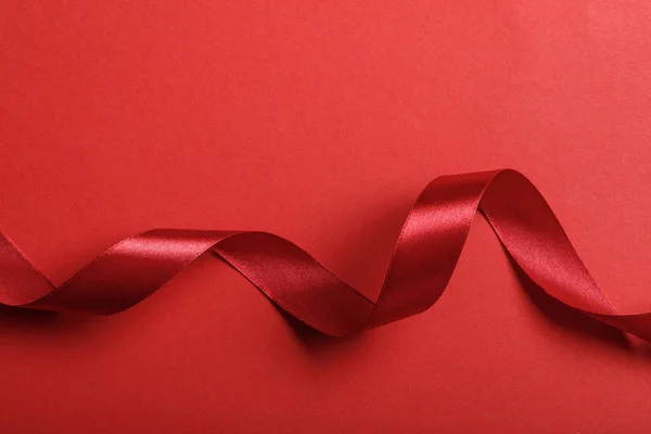 Top View Wavy Silk Red Ribbon Red Background Copy Space — Stock Photo, Image