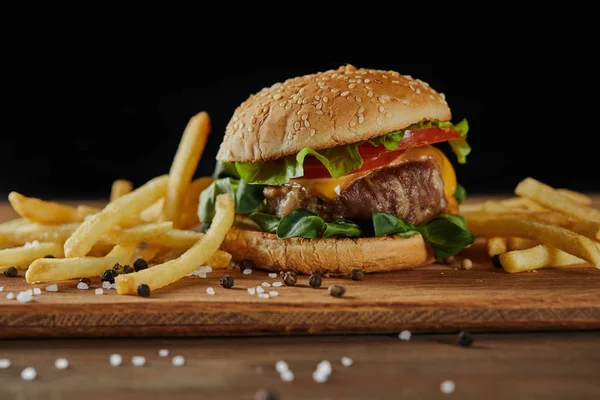 Golden French Fries Tasty Meat Burger Scattered Salt Black Pepper — Stock Photo, Image