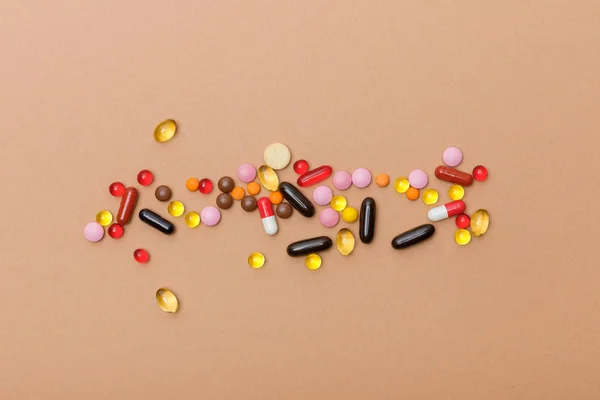 Top View Colorful Pills Brown Surface — Stockfoto