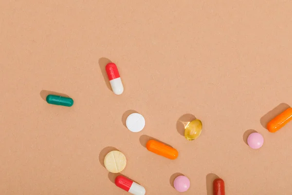 Top View Colorful Pills Brown Surface — Stockfoto