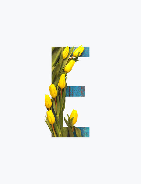 Cyrillic letter with yellow tulips isolated on white