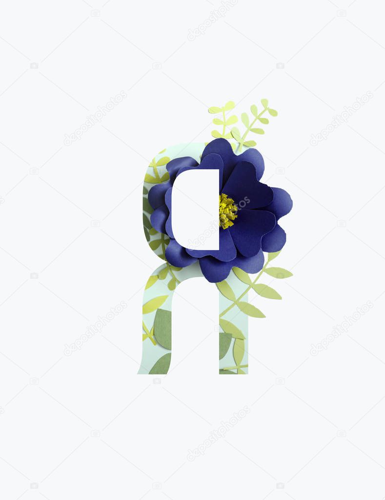 Cyrillic letter with paper cut purple flower and green leaves leaves isolated on white
