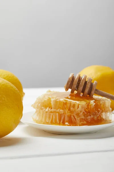 Plate Honeycomb Honey Dripper White Wooden Table Isolated Grey Copy — Stock Photo, Image