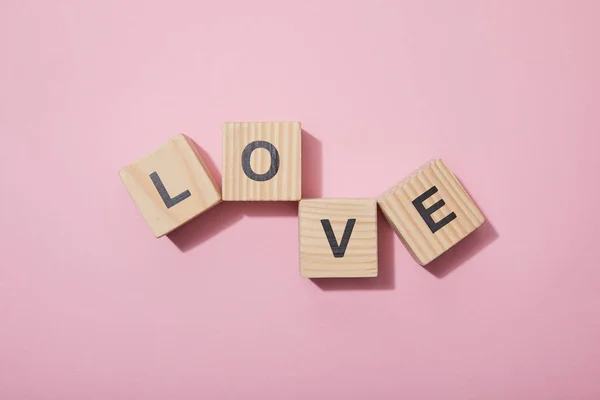 Top View Wooden Cubes Letters Pink Surface — Stock Photo, Image