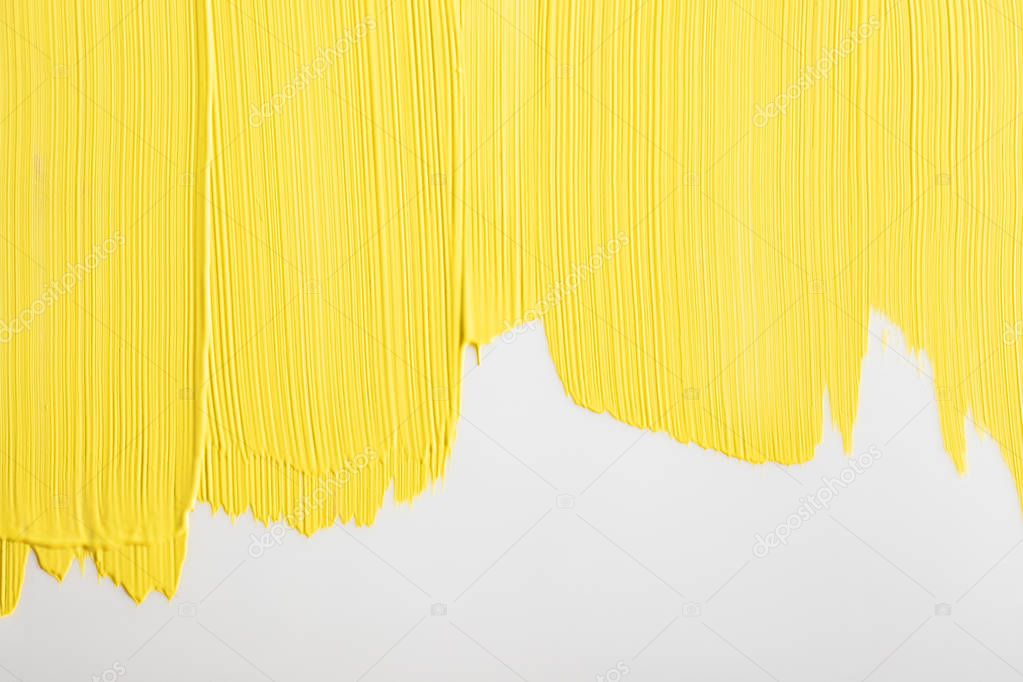 white background painted in yellow with copy space