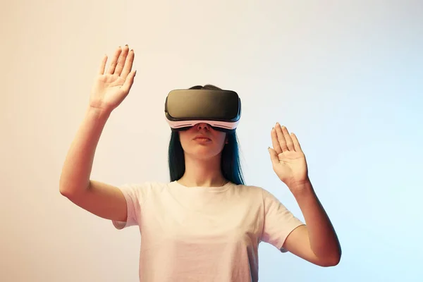 Brunette Woman Virtual Reality Headset Gesturing Beige Blue — Stock Photo, Image