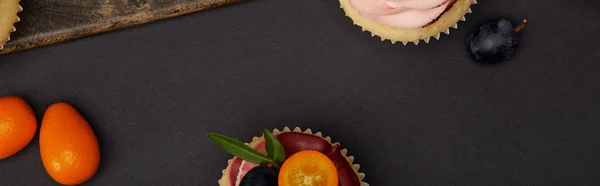 Panoramic Shot Cupcakes Kumquats Black Surface — Stock Photo, Image