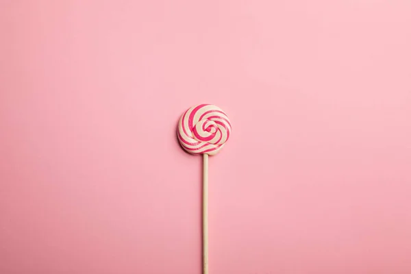 Top View Delicious Multicolored Swirl Lollipop Wooden Stick Pink Background — Stock Photo, Image