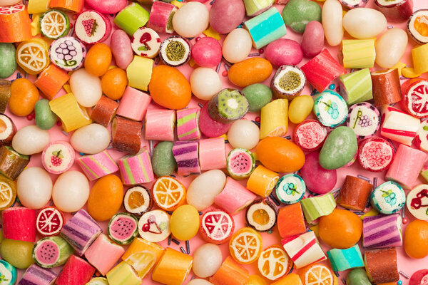 top view of bright delicious multicolored caramel candies