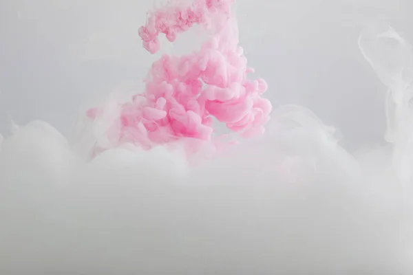 Nahaufnahme Von Rosa Und Weißen Farbwirbeln Isoliert Auf Grau — Stockfoto