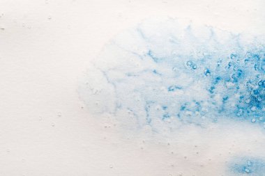 blue watercolor paint spill on white background with copy space clipart