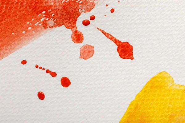 Close View Yellow Red Watercolor Paint Brushstrokes Drops White Textured — Stock Photo, Image