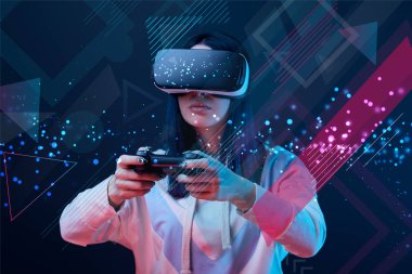 KYIV, UKRAINE - APRIL 5, 2019: Woman in virtual reality headset using joystick on dark background with abstract illustration clipart