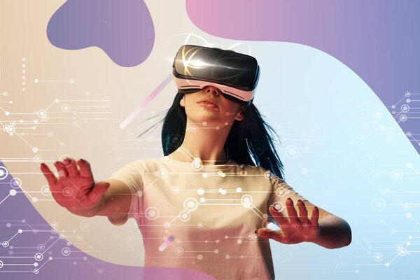 young woman in virtual reality headset gesturing among glowing cyber and abstract purple illustration on beige and blue background