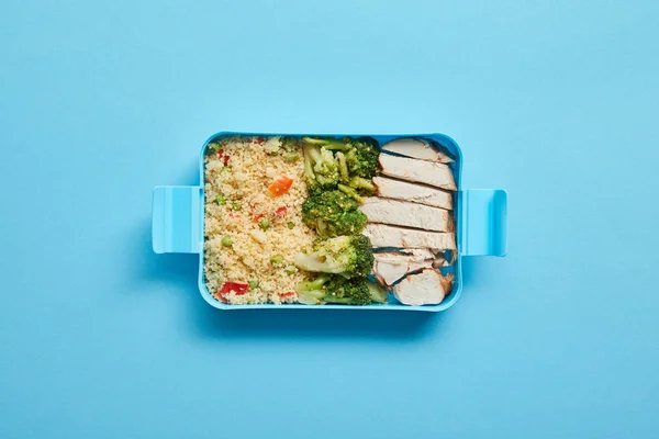 Top View Lunch Box Tasty Chicken Risotto Broccoli Blue Background — Stock Photo, Image