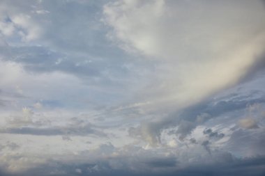 view of white and grey clouds on blue sky background 