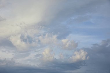 view of white and grey clouds on blue sunlight sky background  clipart