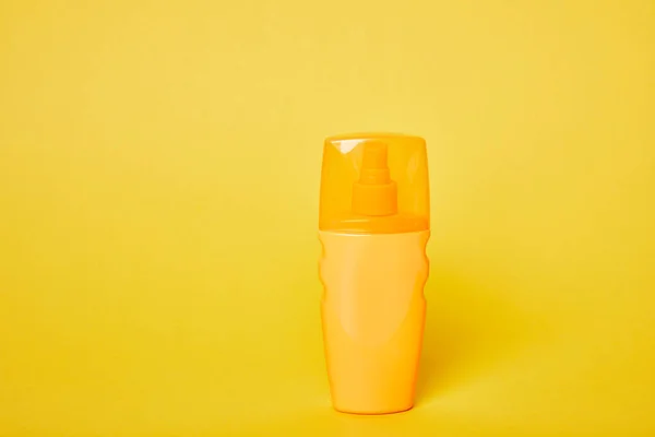 Sunscreen Yellow Bottle Bright Yellow Background — Stock Photo, Image