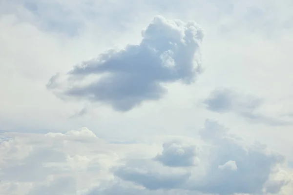 Peaceful blue sky with white clouds and copy space