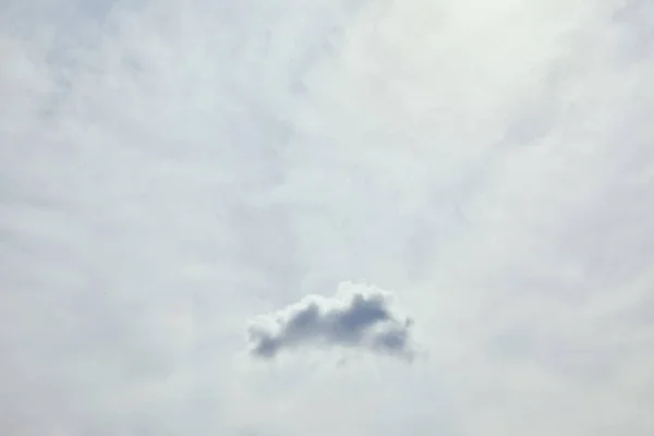 Bright day, peaceful sky with white clouds and copy space