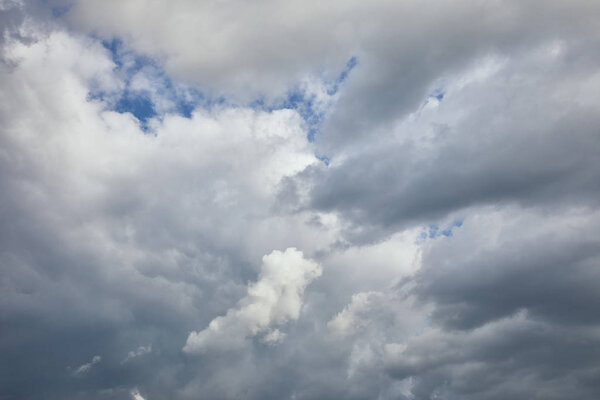 Overcast blue sky with clouds and copy space