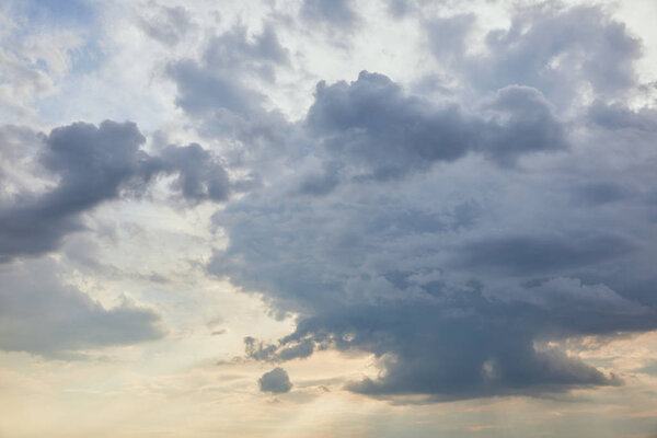 blue clouds on white sunlight sky background 