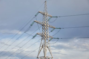 low angle view of electric pole on grey cloudy background  clipart