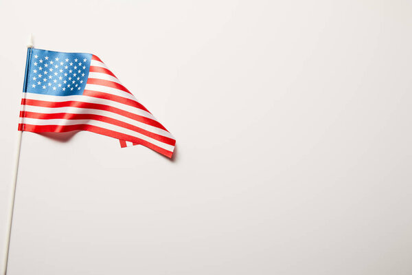 top view of national american flag on white background with copy space