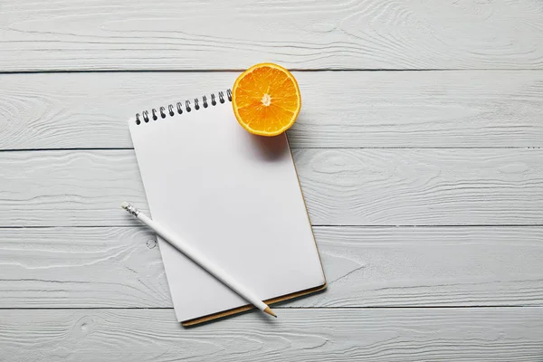 Top View Orange Half Blank Notebook Pencil Wooden White Background — Stock Photo, Image