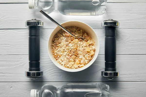 Flat Lay Breakfast Cereal Bowl Bottles Water Dumbbells Wooden White — Stock Photo, Image