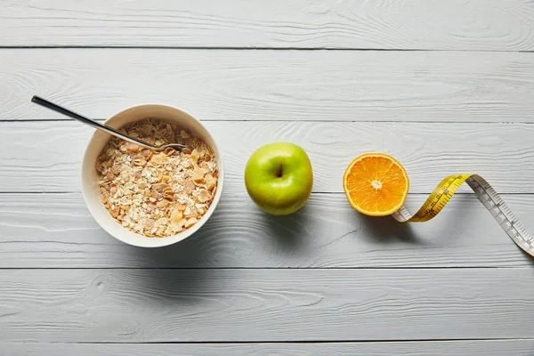 Flat Lay Breakfast Cereal Bowl Apple Orange Measuring Tape Wooden — Stock Photo, Image