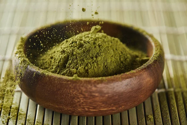 Selective Focus Green Matcha Powder Pouring Wooden Bowl Bamboo Table — Stock Photo, Image