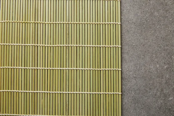 Bovenaanzicht Van Bamboe Tafelmat Stenen Oppervlak — Stockfoto