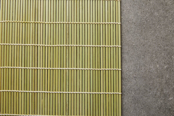 top view of bamboo table mat on stone surface