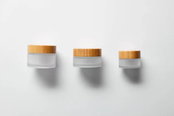 Three Empty Jars Hand Cream White — Stock Photo, Image