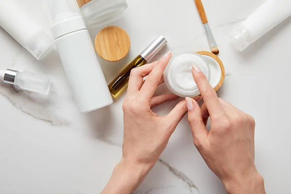 Cropped View Woman Holding Jar Cream Tubes Cosmetic Dispenser Glass — Stock Photo, Image