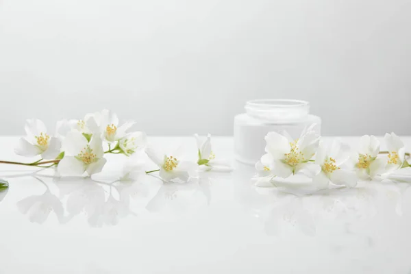 Jasmine Flowers White Surface Jar Cream — Stock Photo, Image