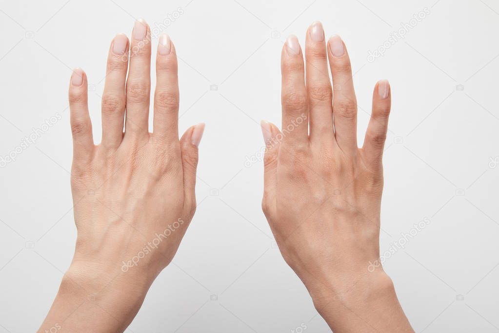 cropped view of woman hands isolated on white