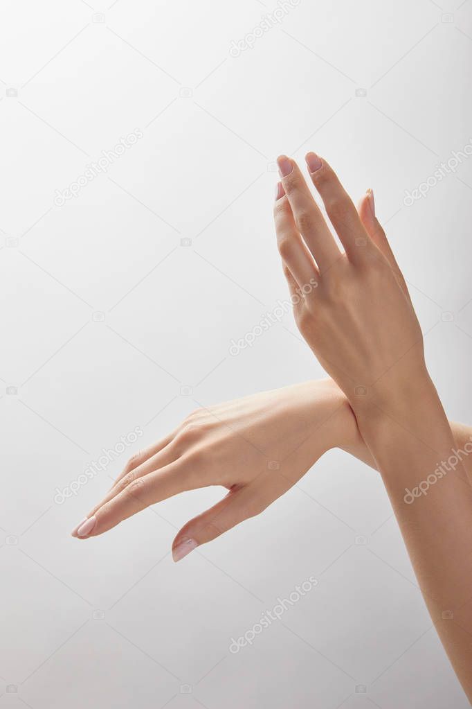 cropped view of woman hands isolated on white