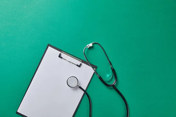 Top View Stethoscope Folder Blank Paper Isolated Green — Stock Photo, Image