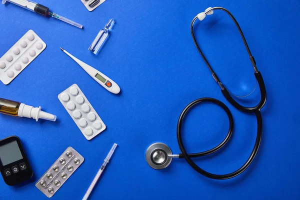 Top View Stethoscope Various Medical Supplies Blue Background — Stock Photo, Image