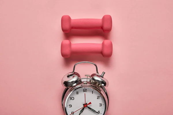 Flat Lay Silver Alarm Clock Pink Dumbbells Pink Background — Stock Photo, Image