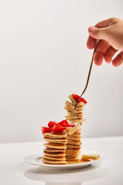 Cropped View Man Taking Slice Pancakes Golden Fork White Plate — Stock Photo, Image