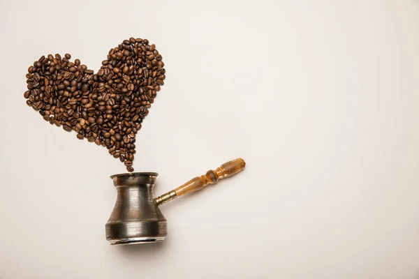Top View Heart Made Coffee Grains Cezve Beige Background — Stock Photo, Image