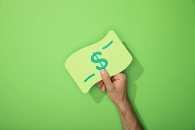 yeşil dolar banknot kağıt simge tutan adam kırpılmış görünümü