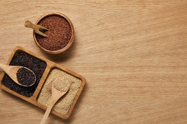 Top View White Black Red Quinoa Wooden Bowls Spoons — Stock Photo, Image