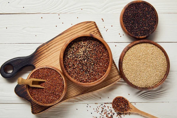 Top View White Black Red Quinoa Wooden Bowls White Table — Stock Photo, Image